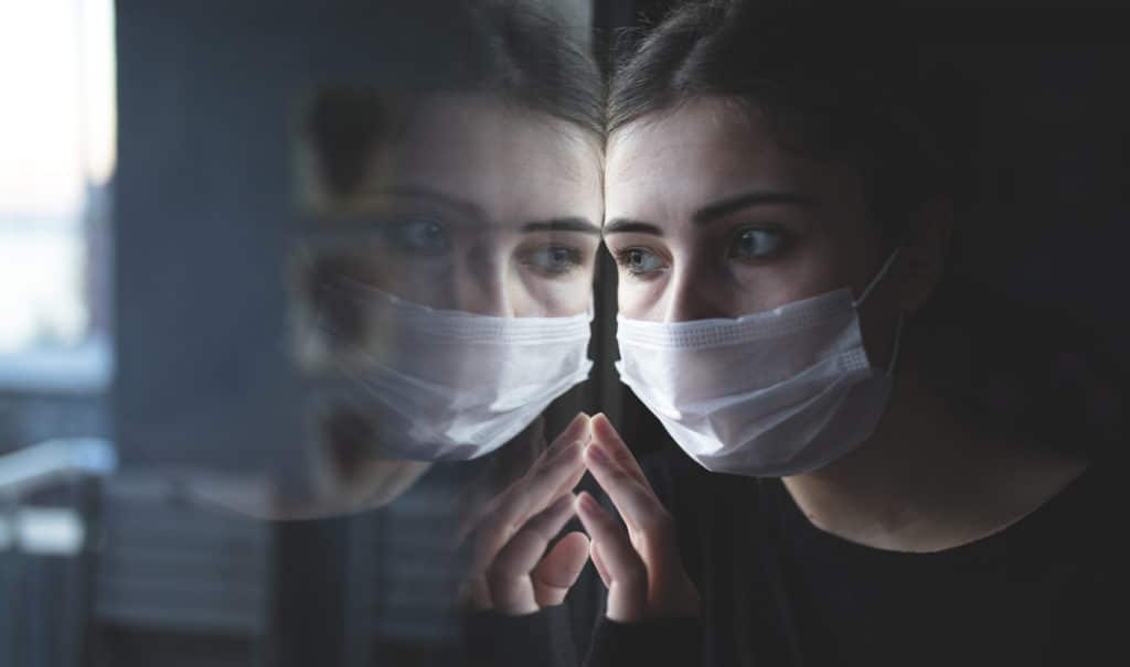 woman-wearing-mask-during-pandemic-mental-health-concept