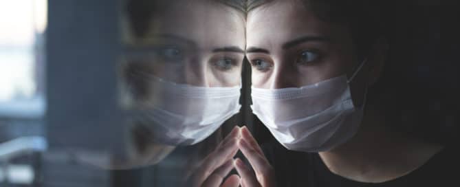 woman-wearing-mask-during-pandemic-mental-health-concept